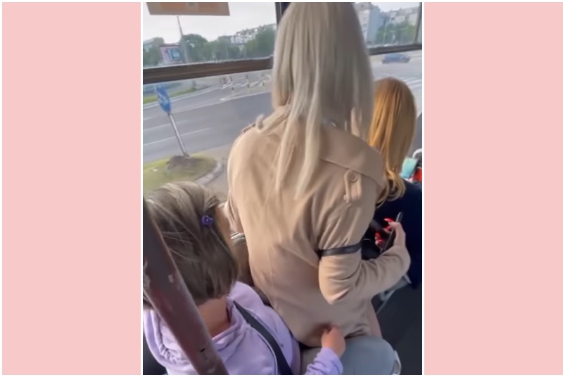 There was no room on the Belgrade tram, so the little girl sat on an old woman’s lap